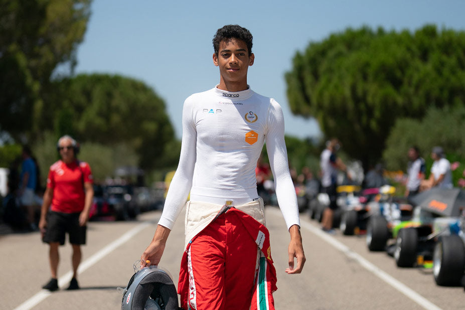 Ugo Ugochukwu f3 racing driver with a cool performance racing simulator