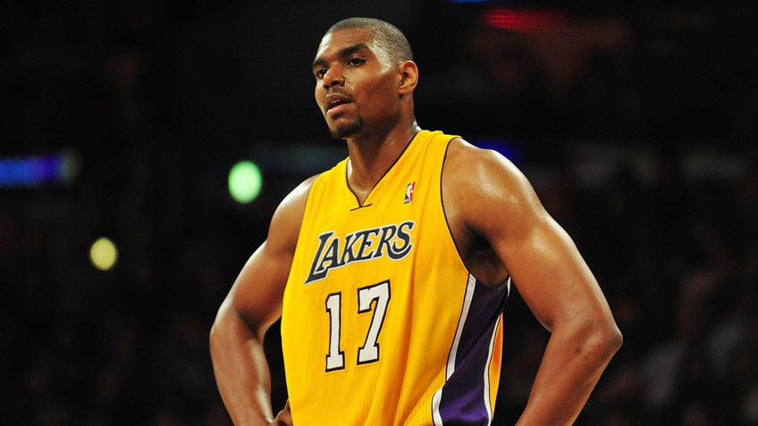 Andrew Bynum NBA basketball player yellow vest