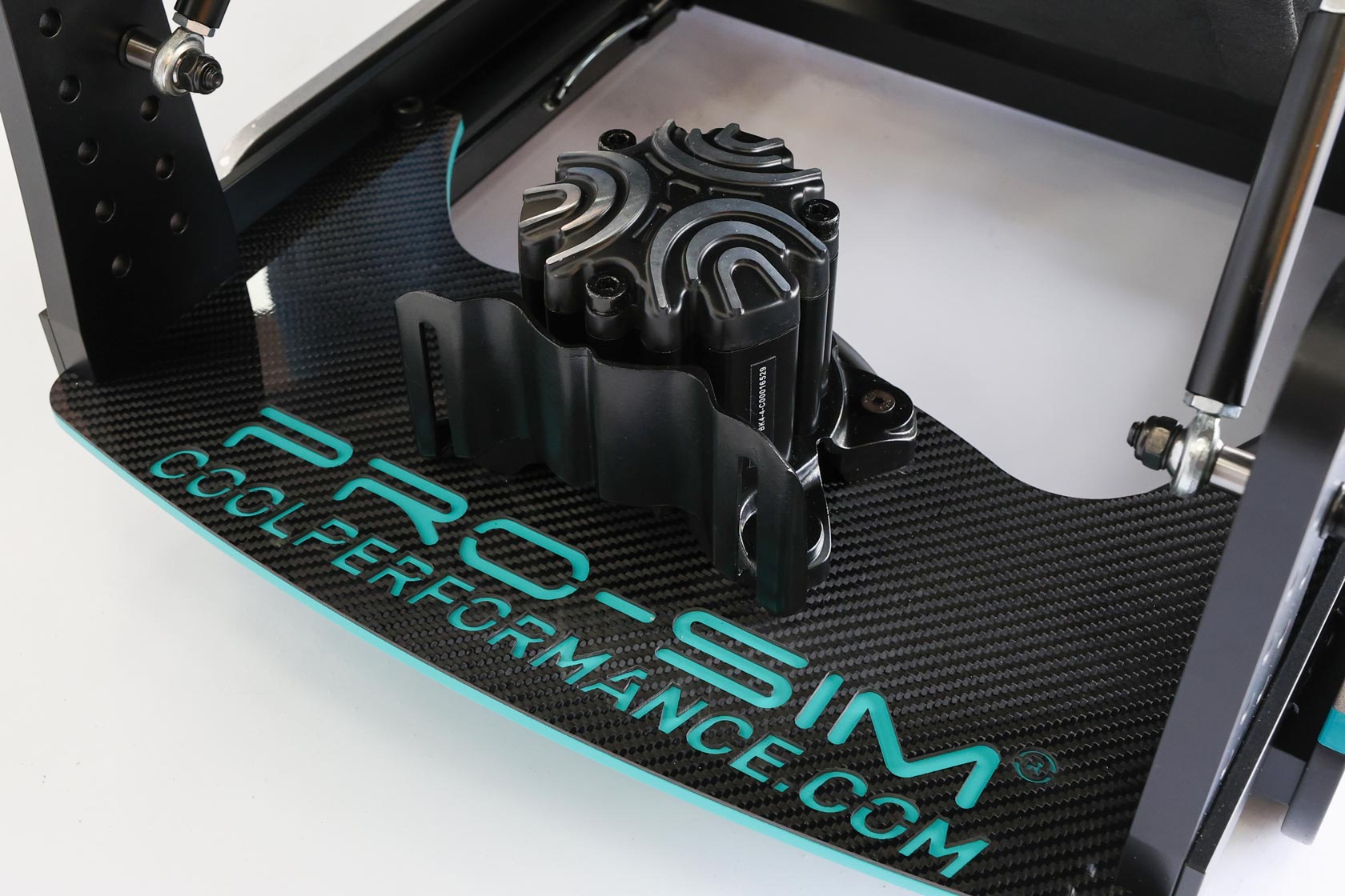 The CP-S Haptic System for sim racing, on Kimi Antonelli's simulator, mounted onto carbon fibre rear cockpit plate