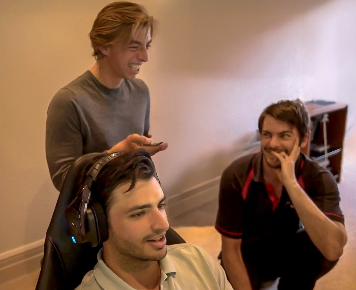 Carlos Sainz in his Cool Performance Formula Pro simulator with the Cool Performance team