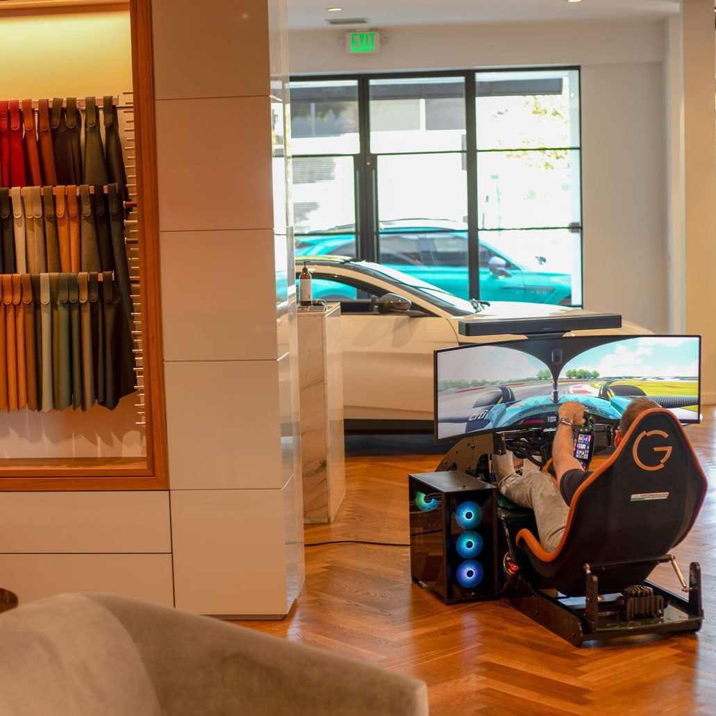 Cool Performance f1 formula pro simulator at Ogara coach la aston martin dealership