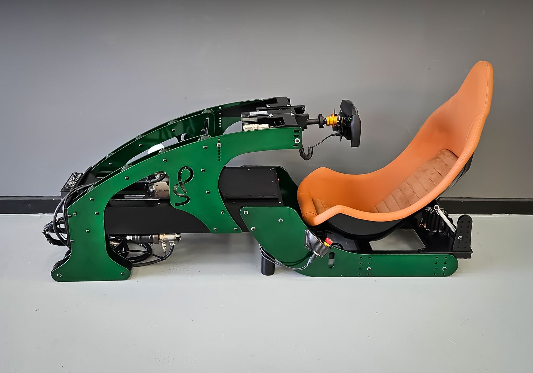 formula pro racing simulator in green with custom tan seating