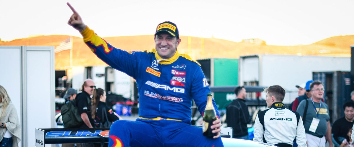 Kenny Habul celebrating the Intercontinental GT Challenge drivers' title