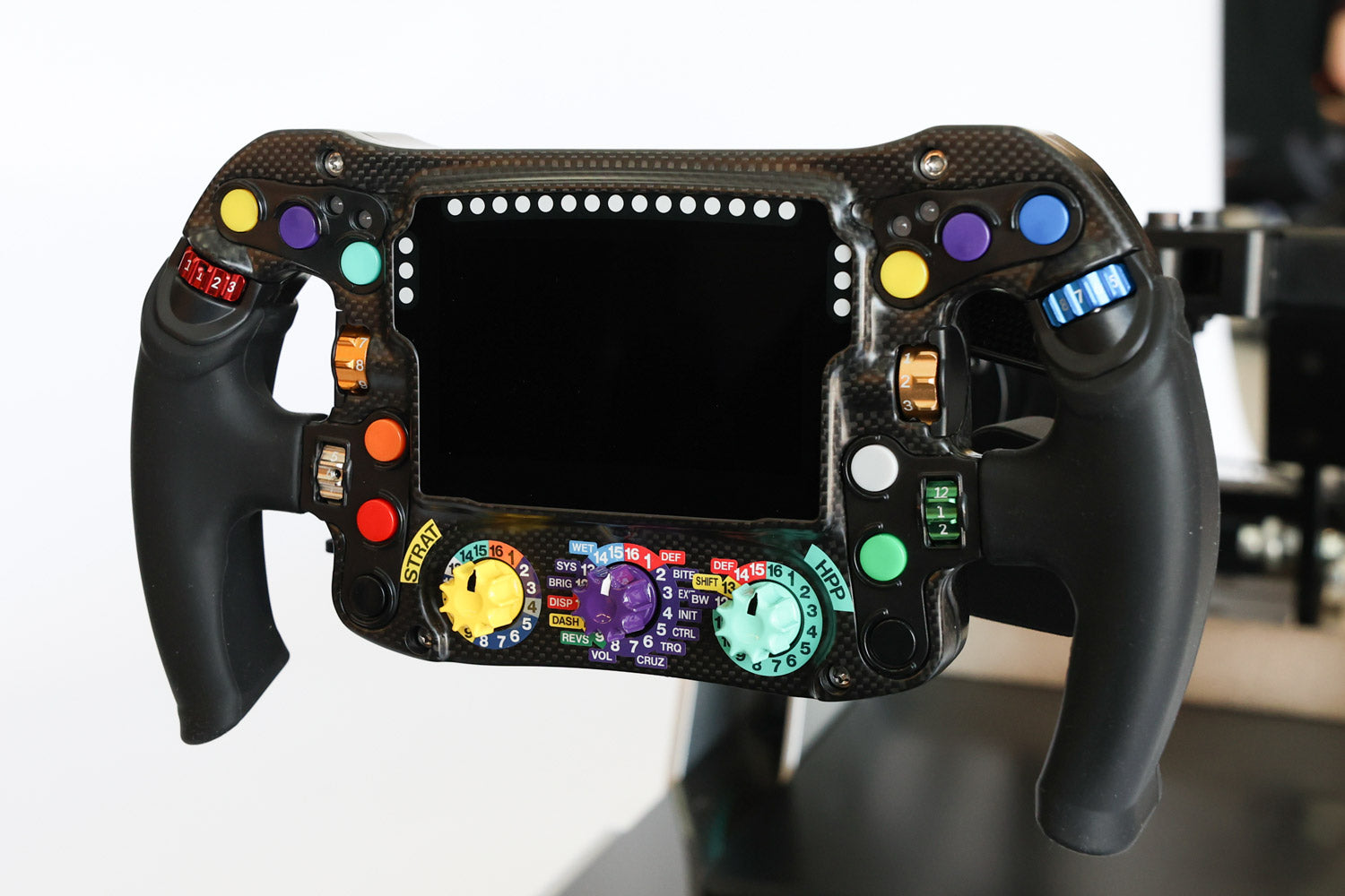 Front view of Kimi Antonelli's steering wheel on his Formula Pro F1 racing simulator