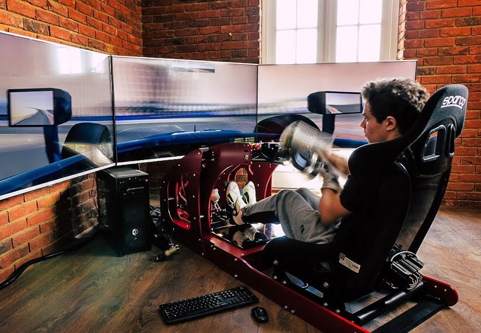 Lando Norris training with ultra realistic cool perfomance formula pro simulator