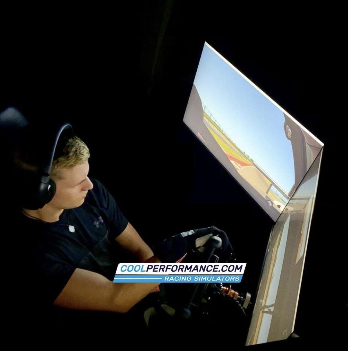 Mick Schumacher driving a Cool Performance Formula Pro simulator