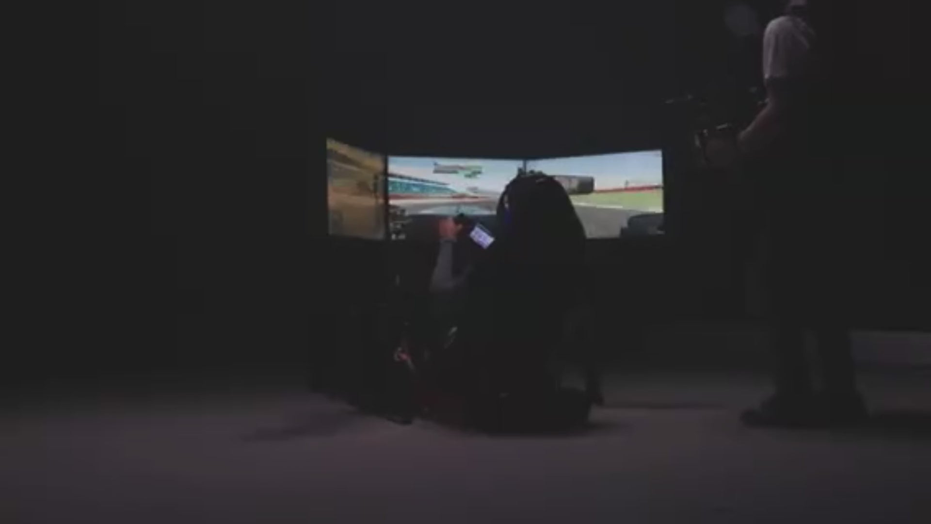 Load video: Lando Norris (Formula 1 Driver) using Cool Performance Racing Simulator Rental and Hire in the USA for content creation