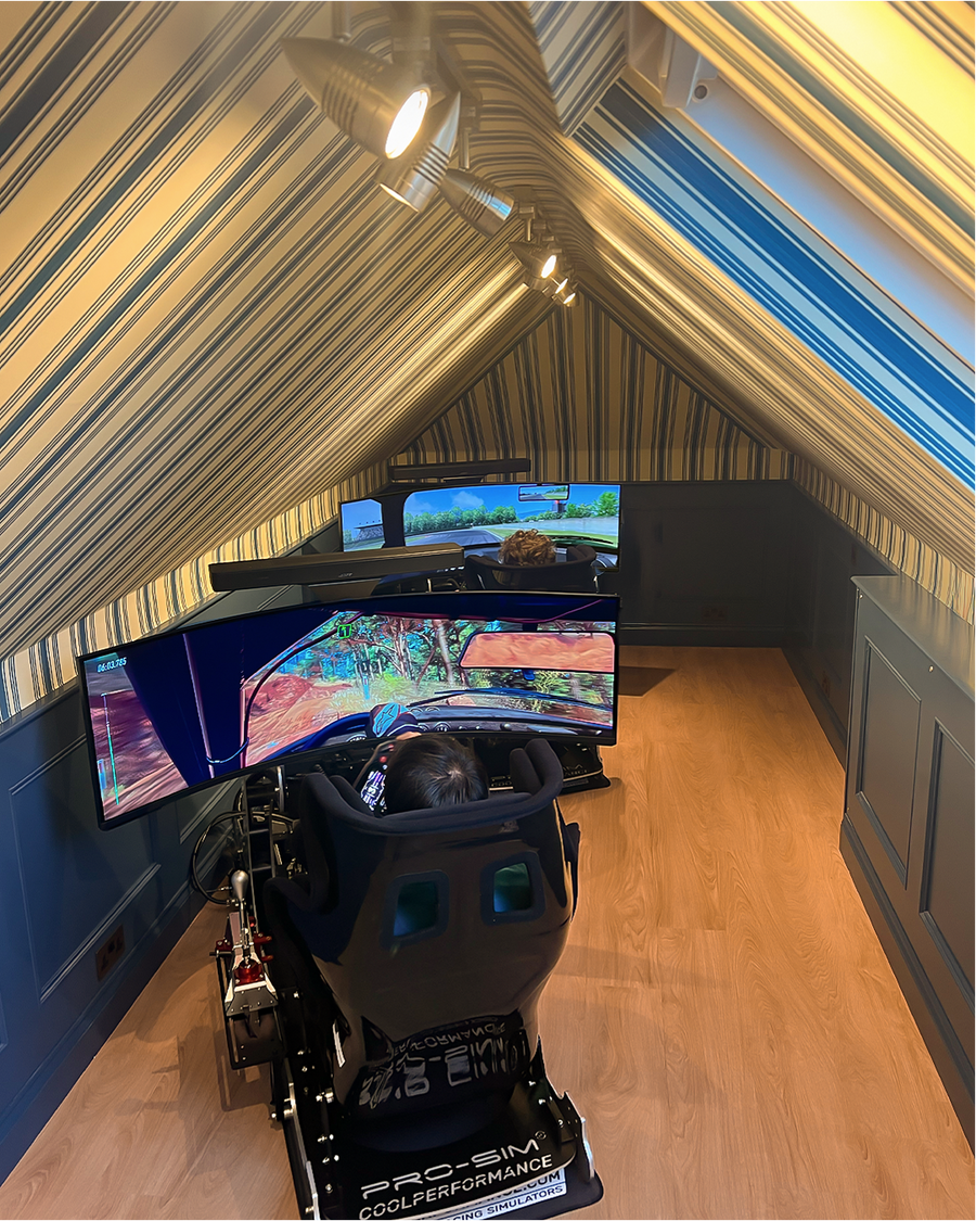 Two GT Pro simulators in an attic games room in Scotland