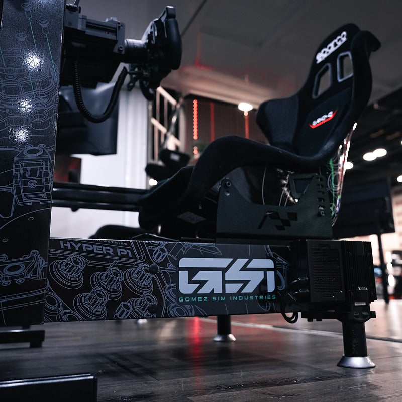Racing simulator setup with motion and custom branding.