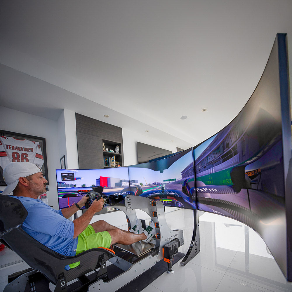 GT Pro racing simulator setup with triple monitors for simulating GT racing