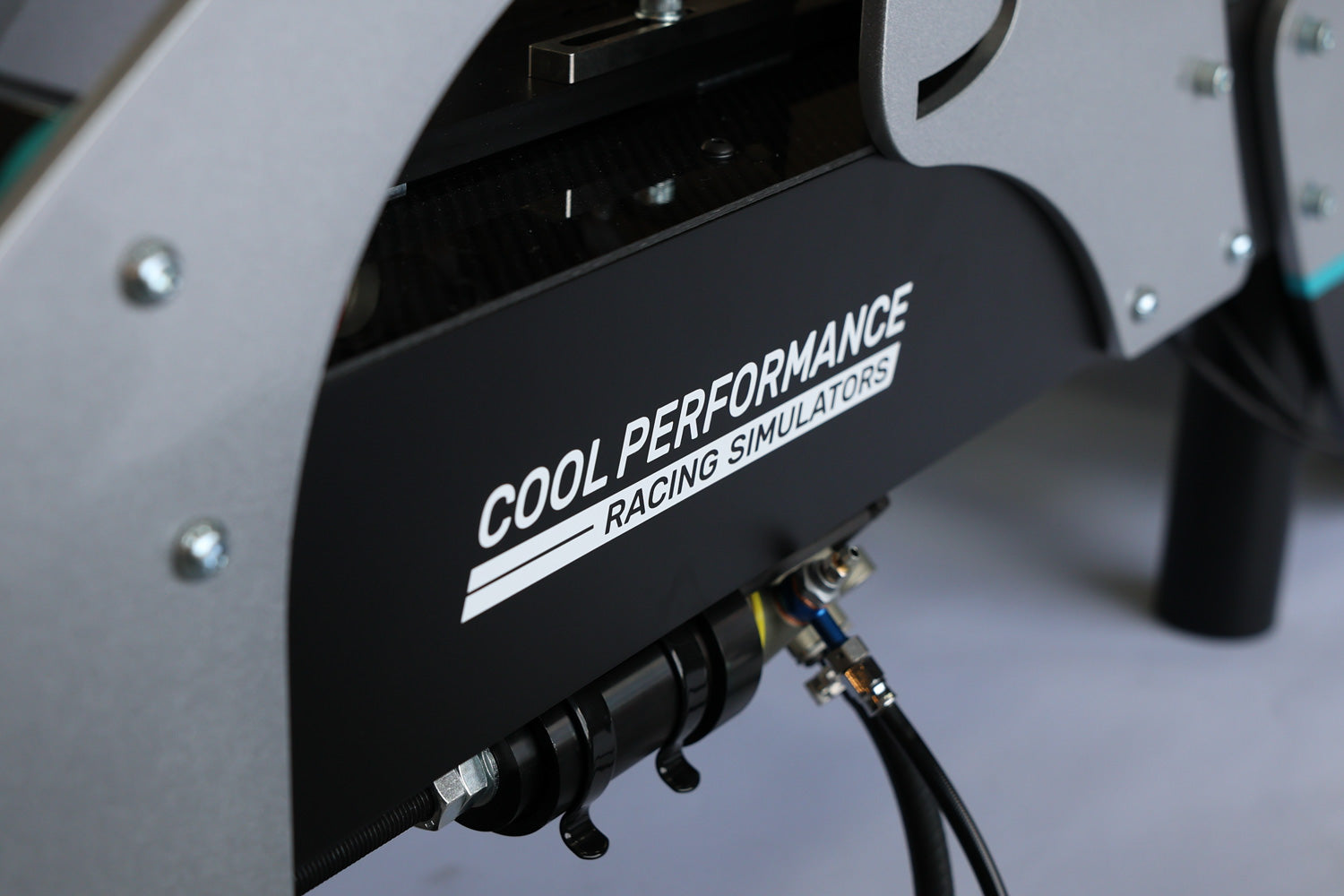 The Cool Performance logo on the cockpit of Kimi Antonelli's racing simulator