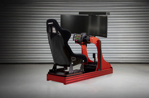 GT Sport racing simulator with black seat and red frame in road car driving position