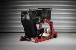 GT Pro racing simulator with red frame and upright GT-style seating position