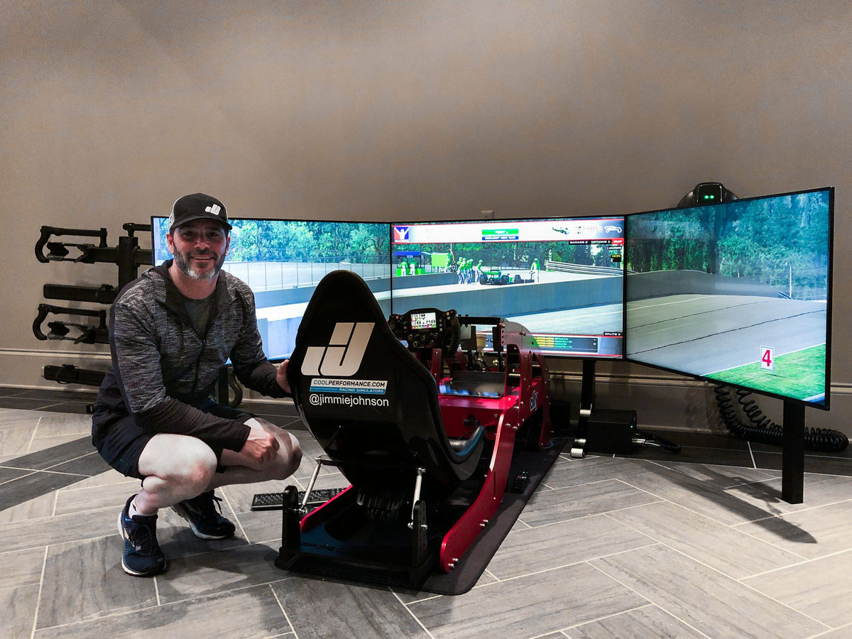 Jimmie Johnson with his Cool Performance Formula Pro simulator