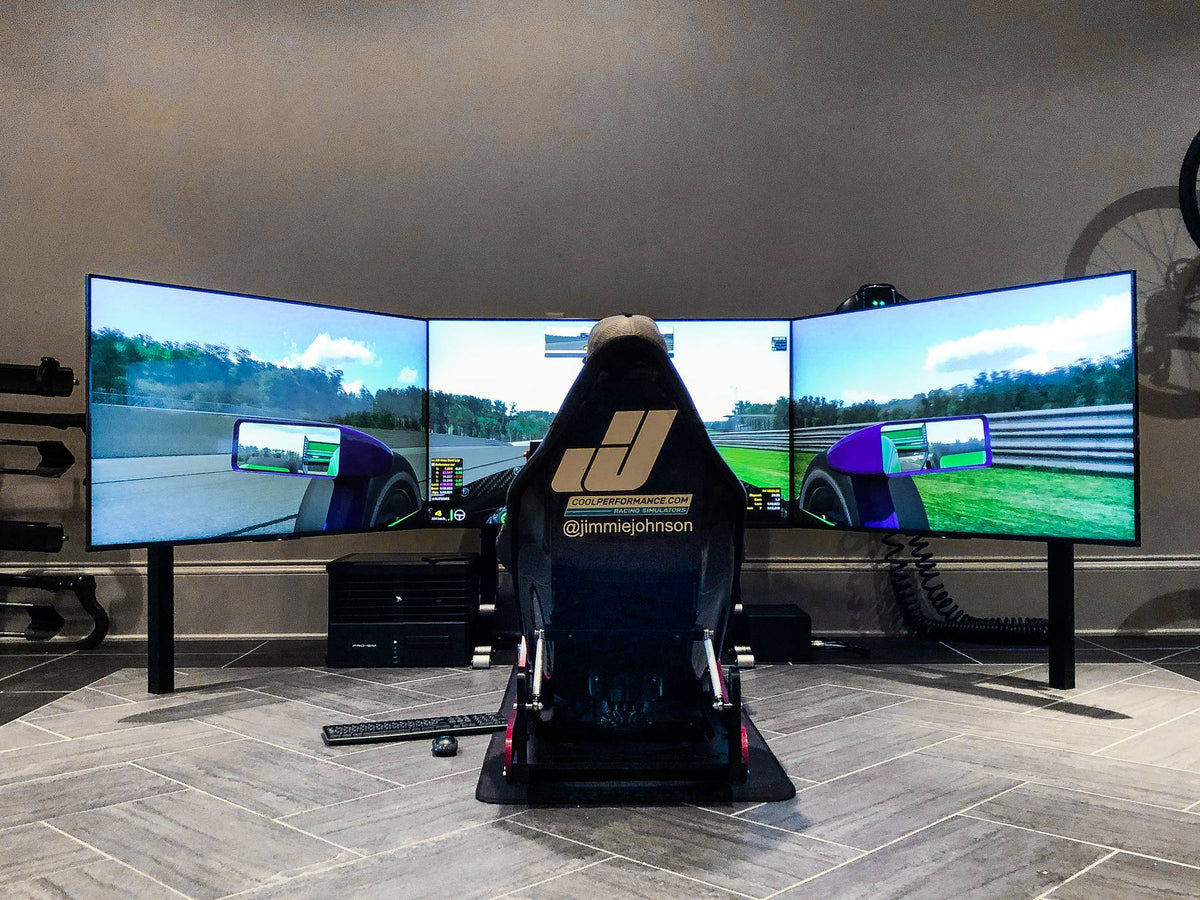 Jimmie Johnson's Cool Performance Formula Pro simulator with triple screens