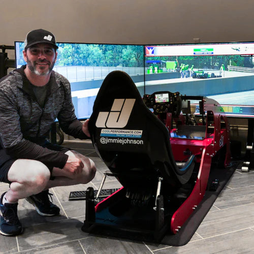 NASCAR legend Jimmie Johnson with his Cool Performance Formula driving simulator