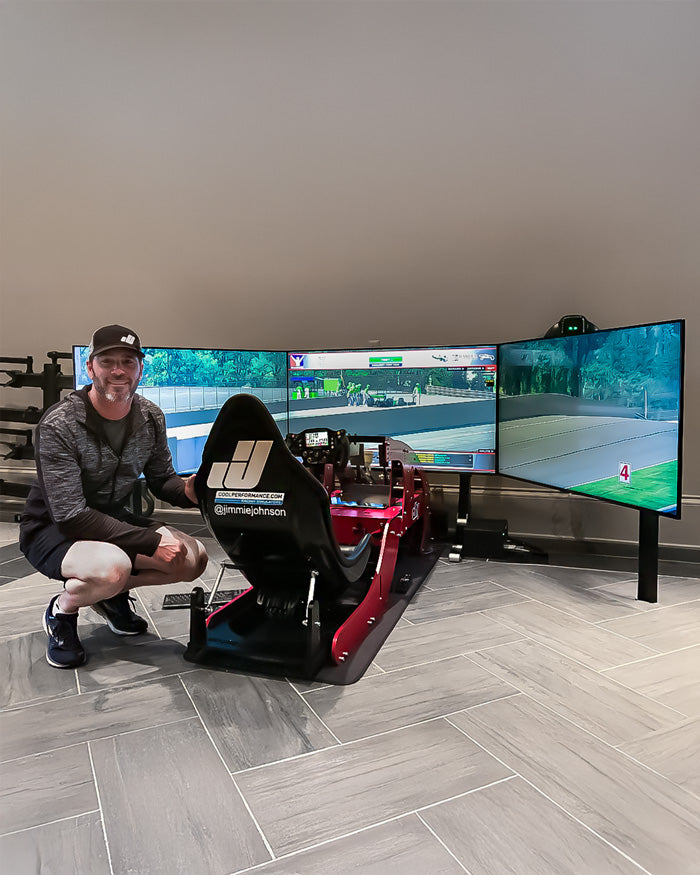Jimmy Johnson with his Formula Pro F1 sim from cool performance