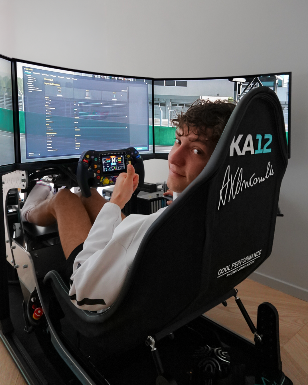 Kimi Antonelli giving a thumbs up seal of approval on his Formula Pro, realistic F1 simulator from Cool Performance
