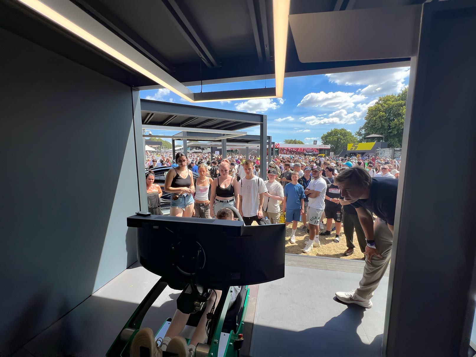 Lanzante Ltd stand at Goodwood Festival of speed using a Cool Performance racing simulator
