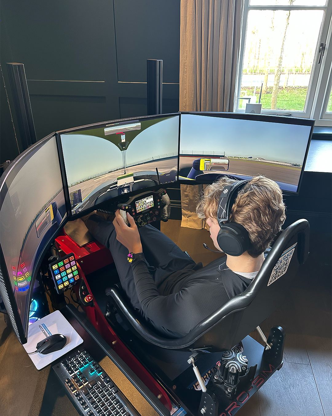 Noah Lisle driving his Cool Performance Formula Pro simulator