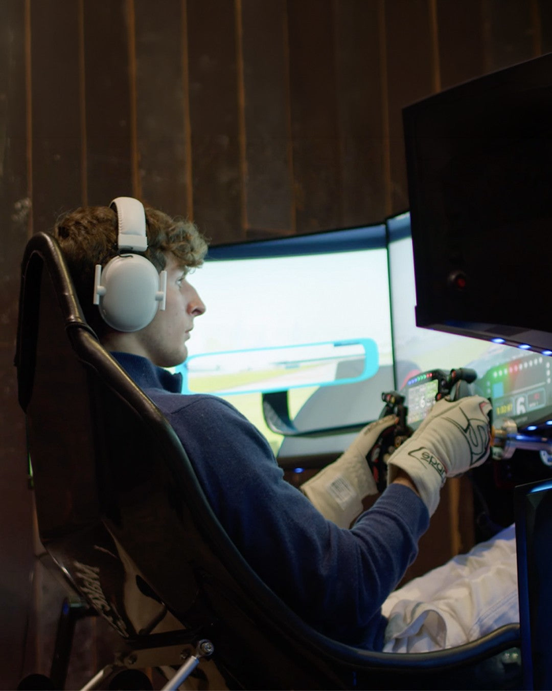 Roman Bilinski driving a Cool Performance Formula Pro simulator