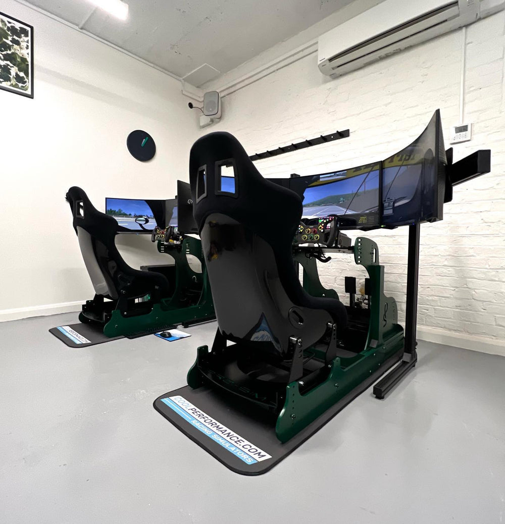 Two custom green E-Sport simulators installed in an office, UK