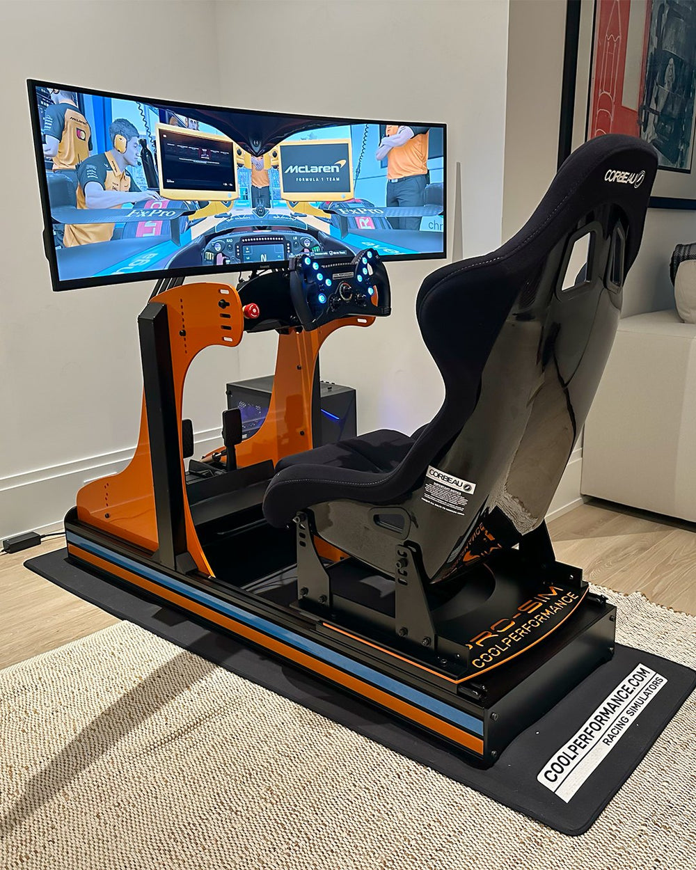 GT Sport in McLaren papaya orange with blue highlight in a home, The Hamptons, New York, USA