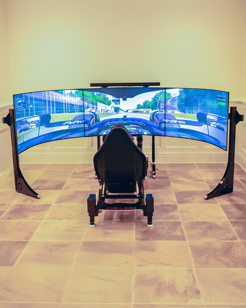 Formula Pro with D-Box motion and triple 55 inch Samsung Ark monitors in a home