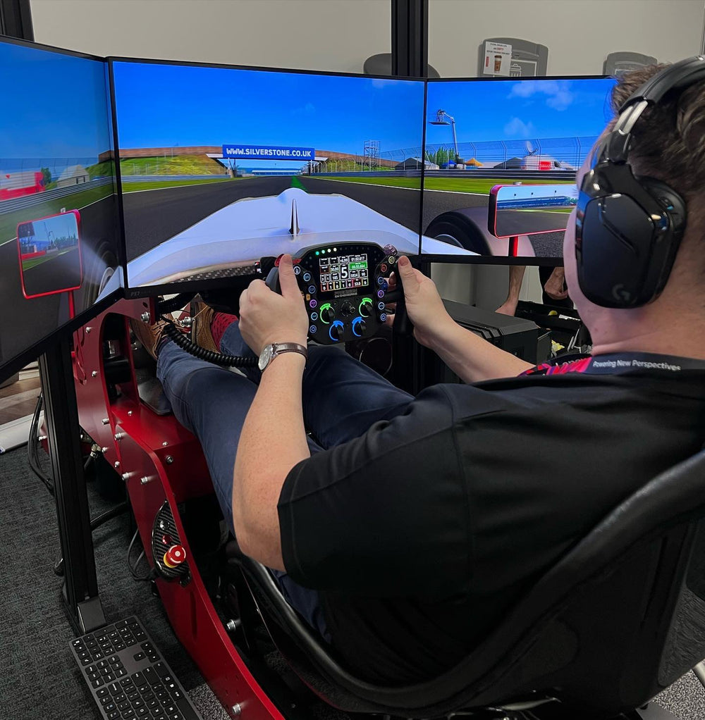 Formula simulator in use at a Lenovo UK team day, UK