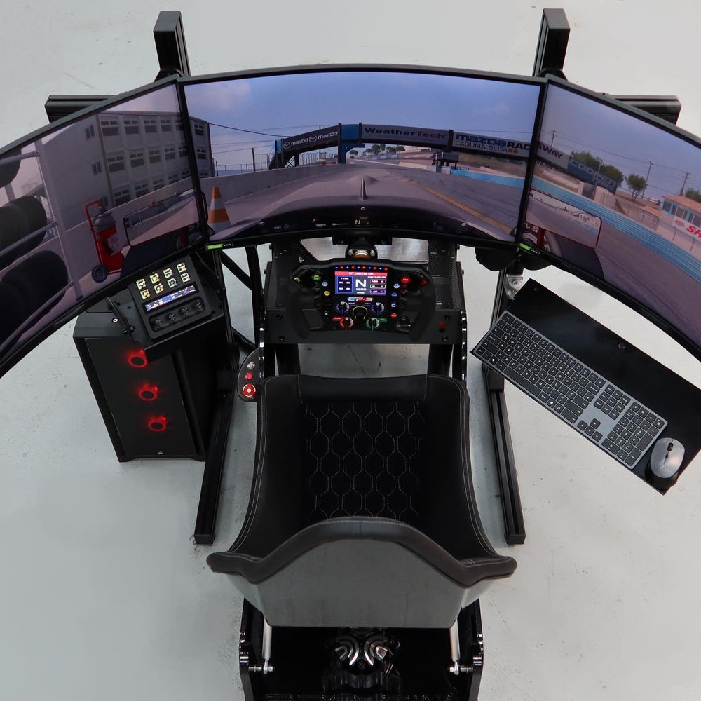 Personalised Formula simulator with quilted seat and triple screens, built for a home