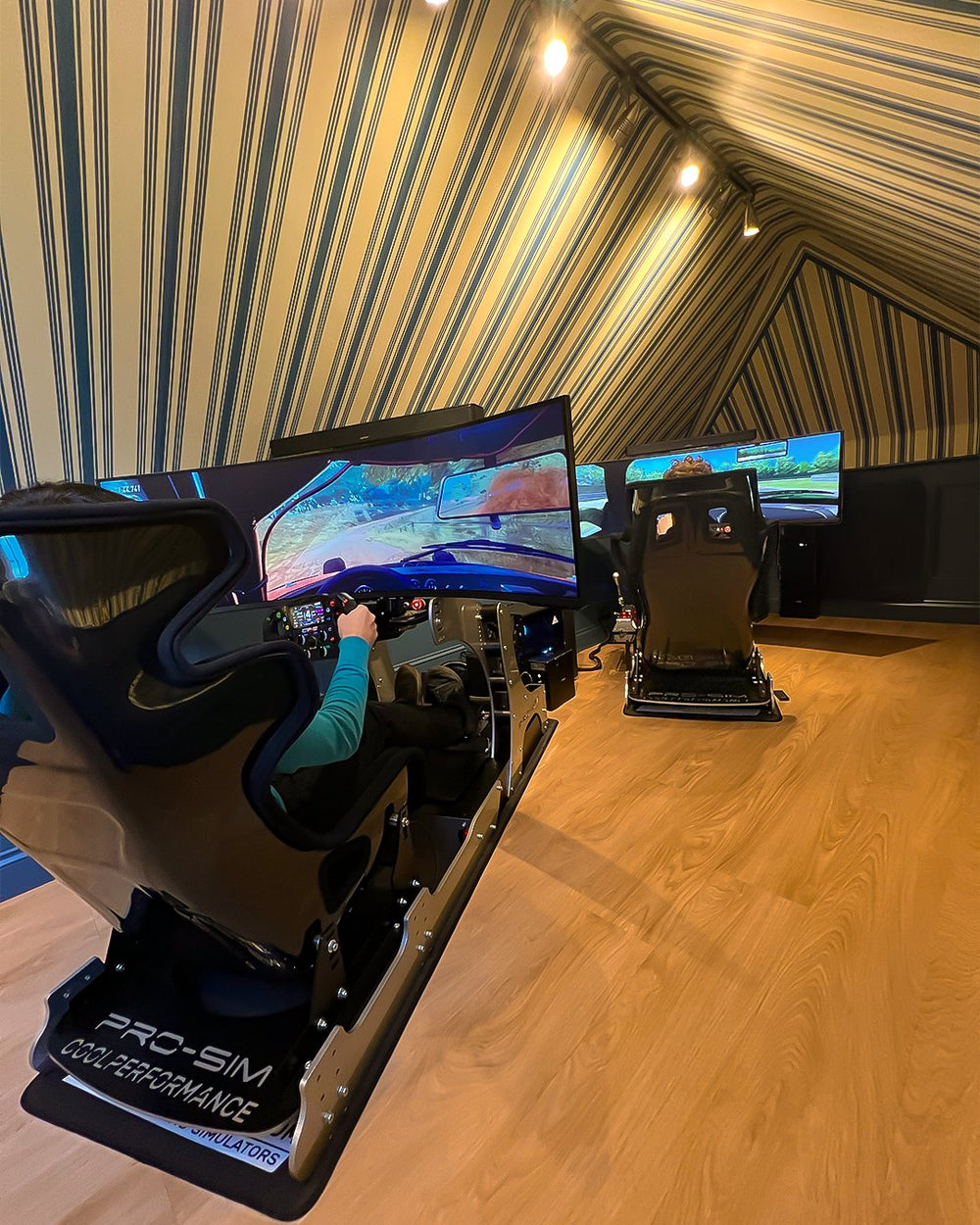 Two GT Pro simulators in a custom powder coat side by side in a home attic, Scotland, UK
